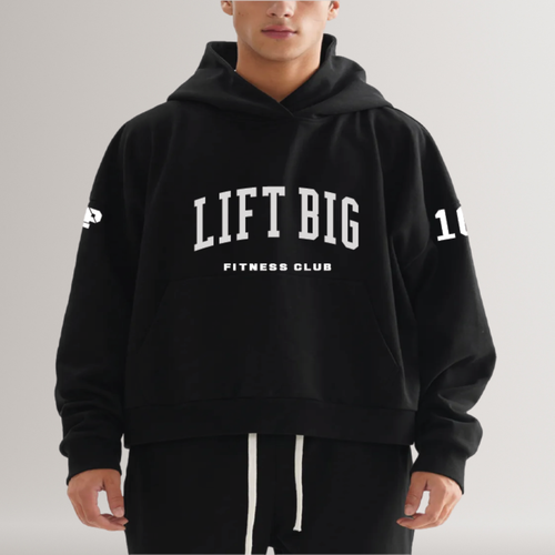 Person wearing a black hoodie with 'LIFT BIG Fitness Club' text on a gray background