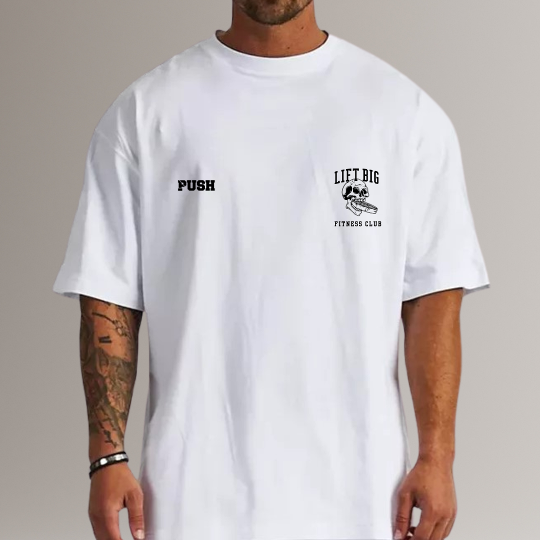 White t-shirt with 'Push' and 'Lift Big Fitness Club' text on a plain background