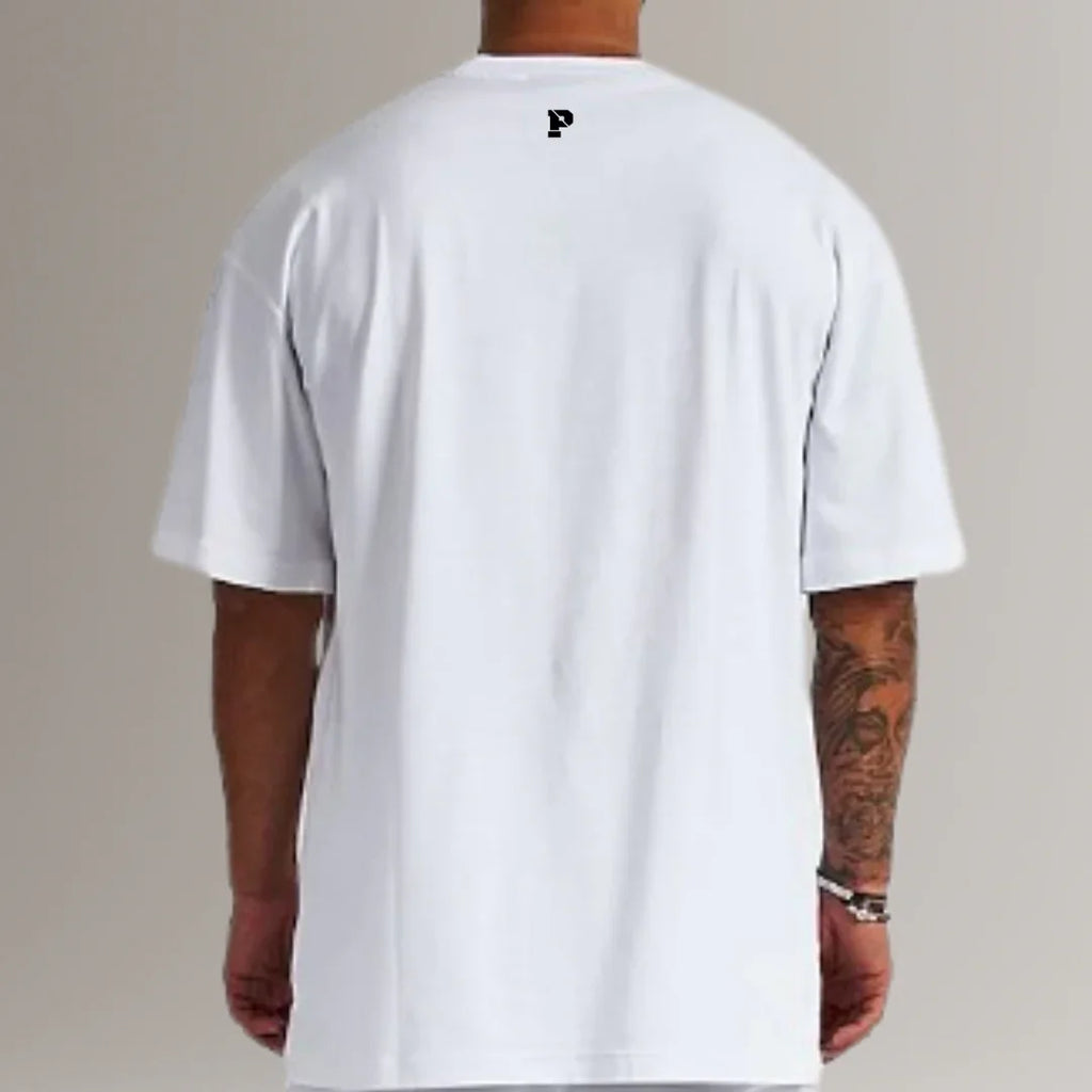 Man wearing white fitness t-shirt with small logo on back, relaxed fit, tattooed arm