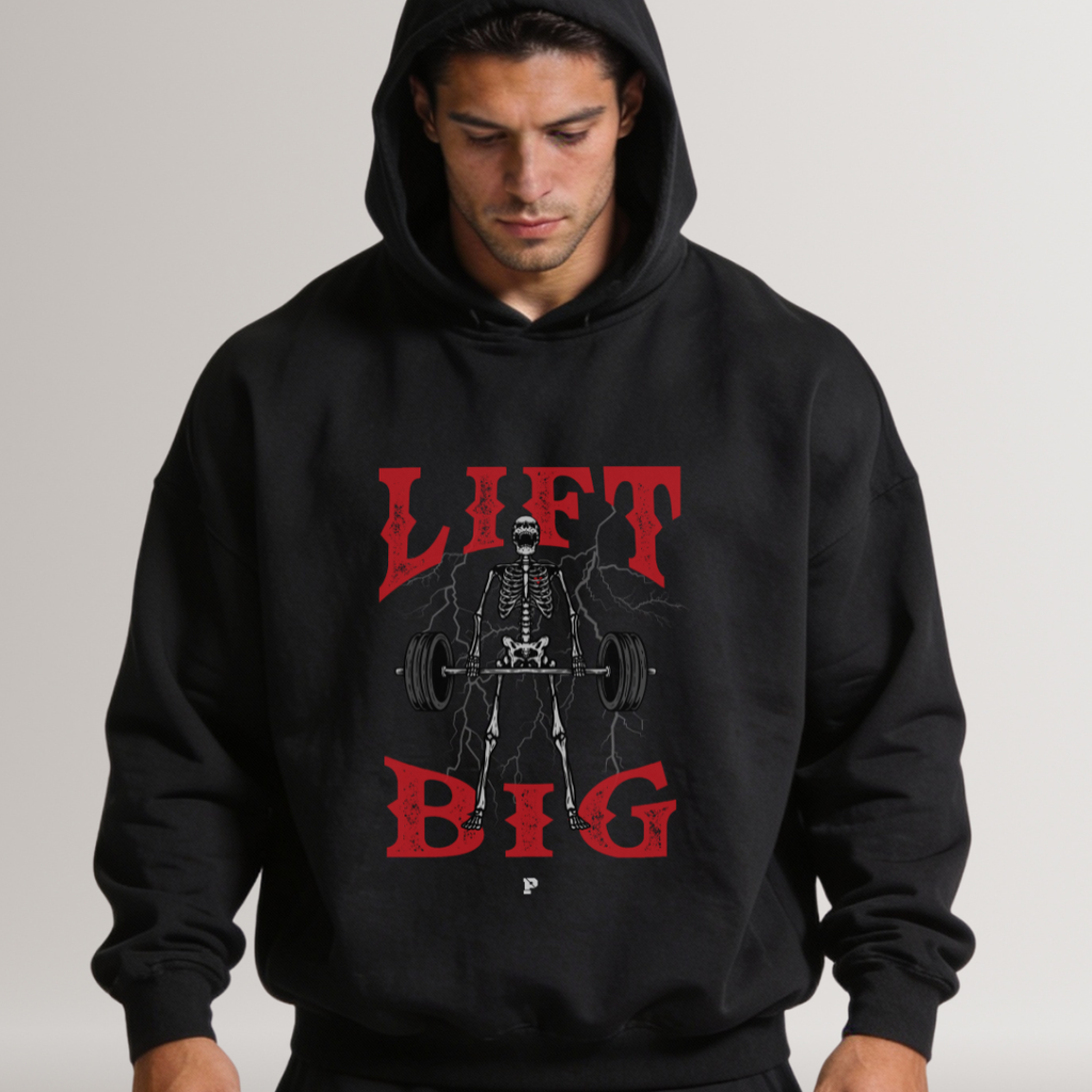 Person wearing a black hoodie with a skeleton lifting weights graphic and 'LIFT BIG' text.