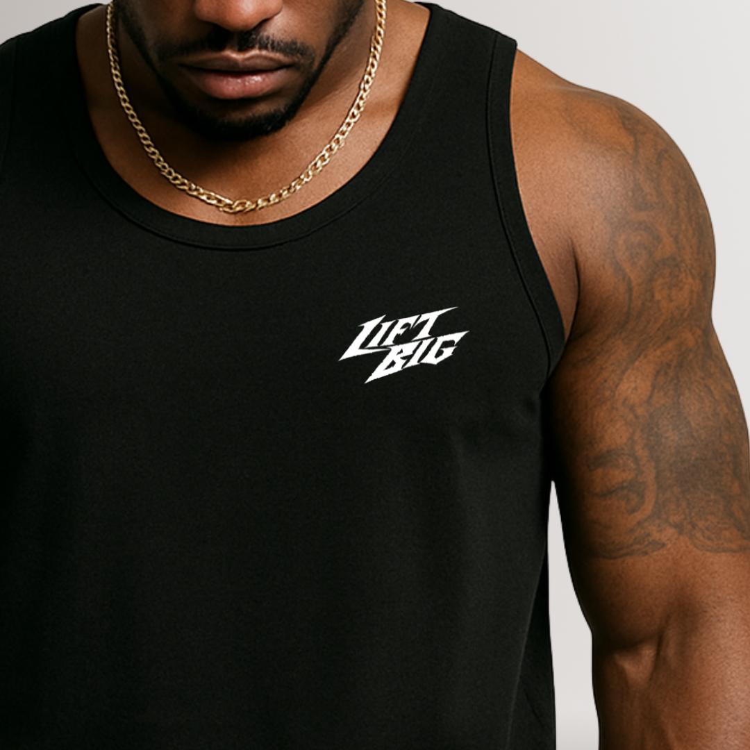 Person wearing a black tank top with 'Lift Big' text, gold chain necklace, and tattoos on arm.