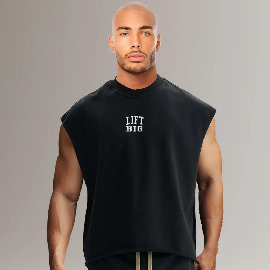 Man wearing black sleeveless gym shirt with 'LIFT BIG' text, fitness apparel
